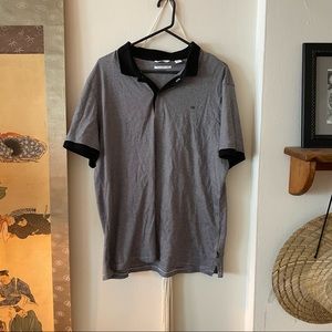 Calvin Klein black and white stripped casual mens t-shirt with two button collar